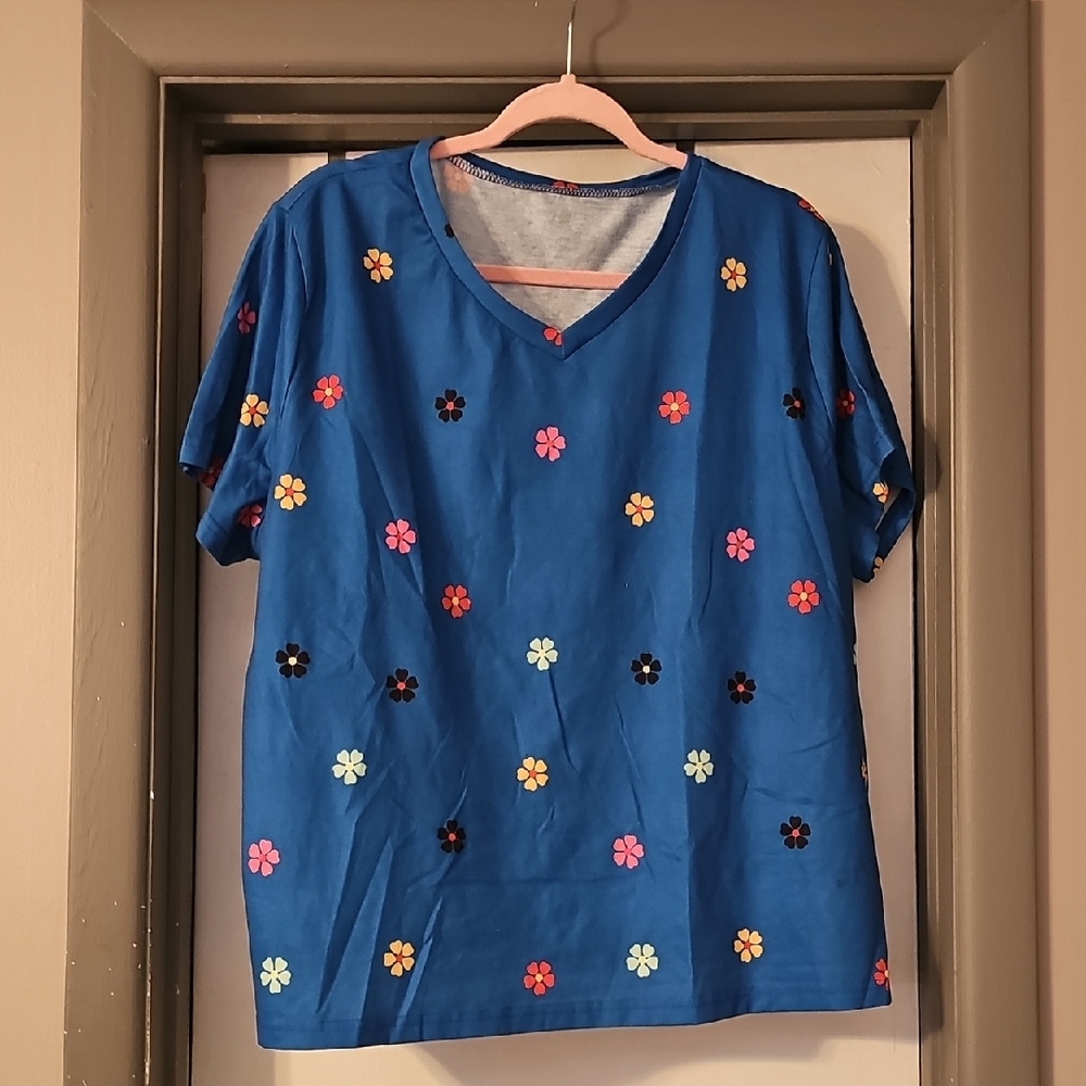 Vibrant Blue Tee with Floral Accents